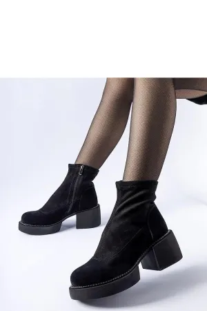 Black insulated ankle boots on a massive block