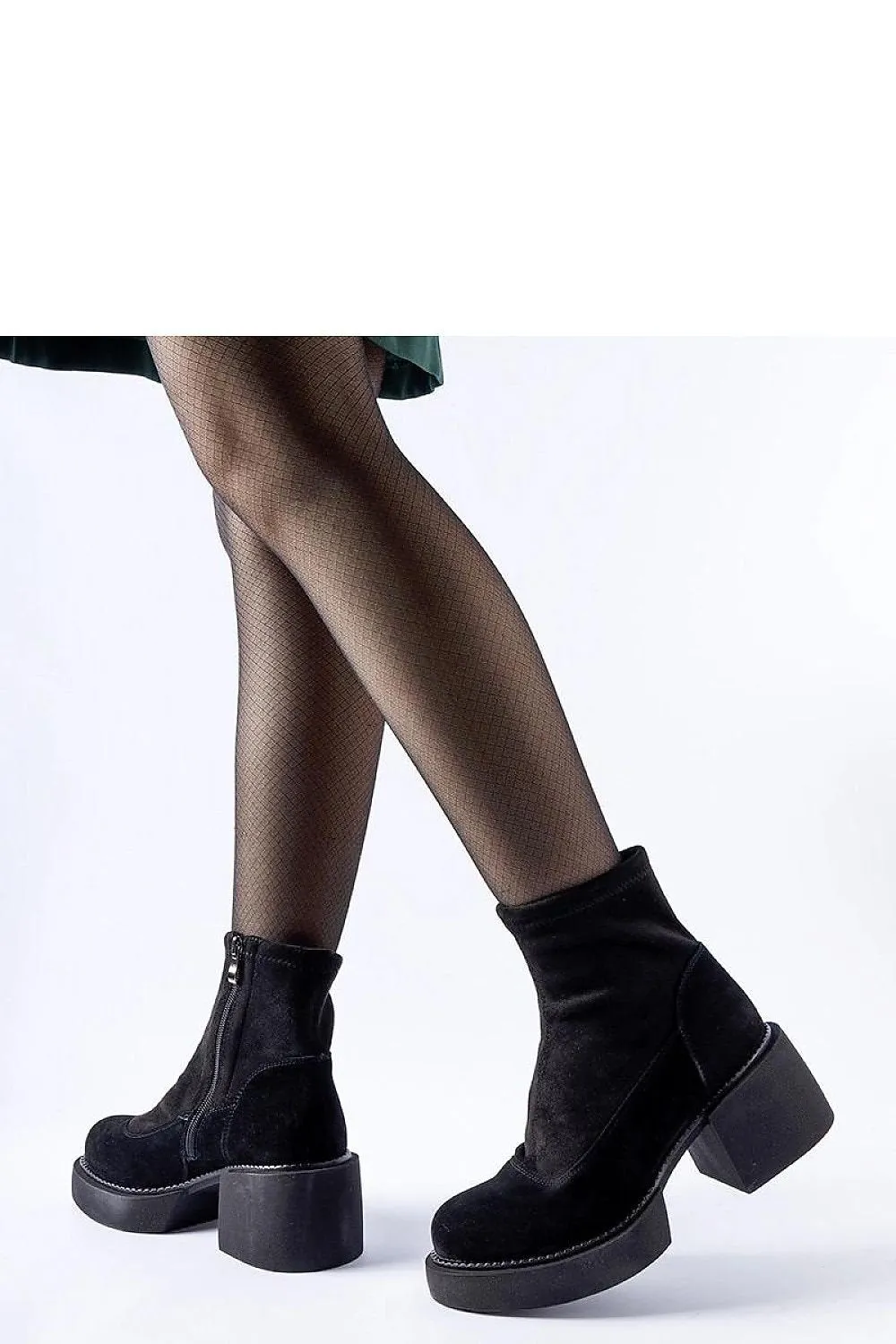 Black insulated ankle boots on a massive block