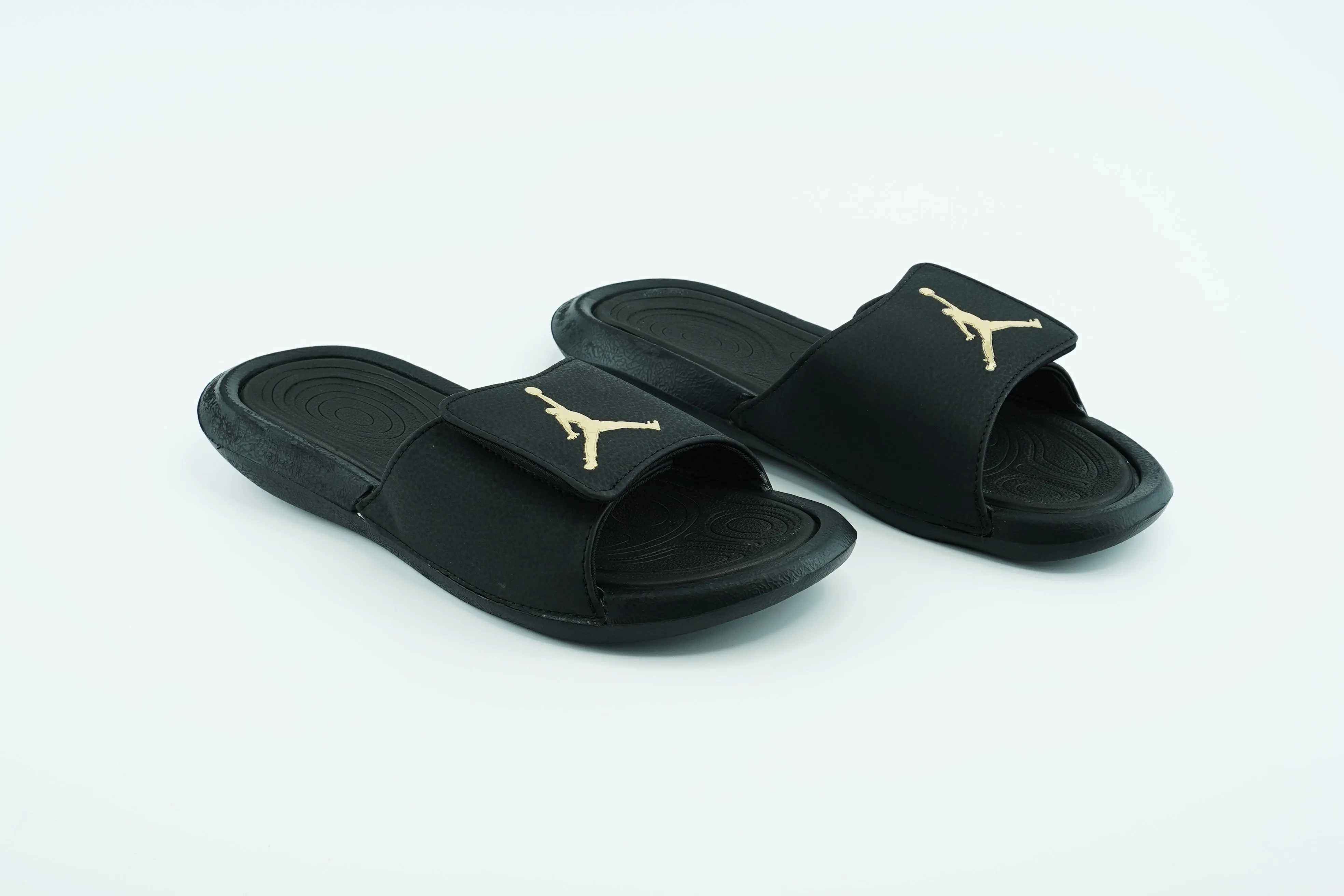 Jordan Slides in black color  with golden color logo