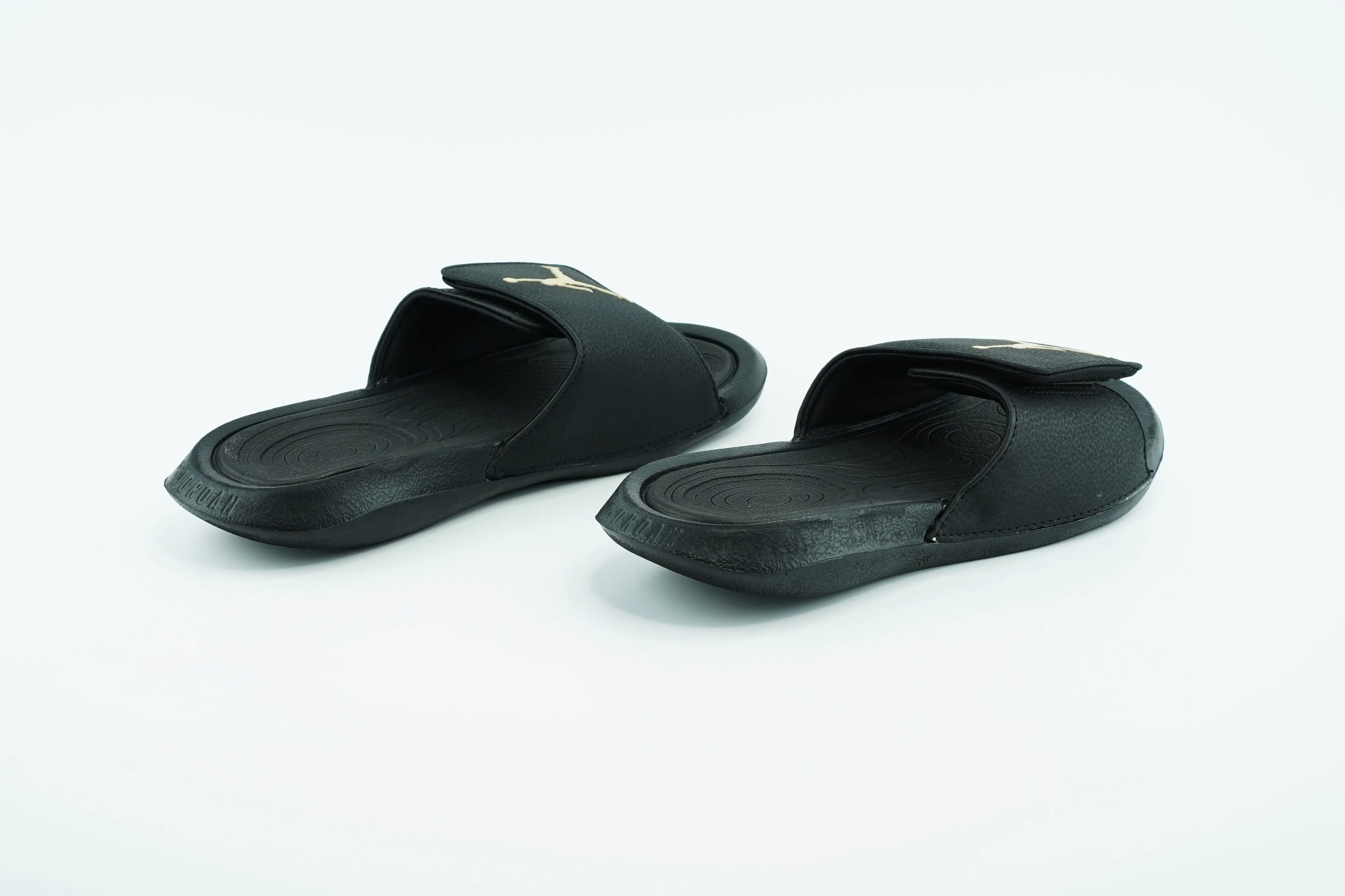 Jordan Slides in black color  with golden color logo